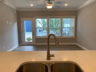 a kitchen with a sink and a window