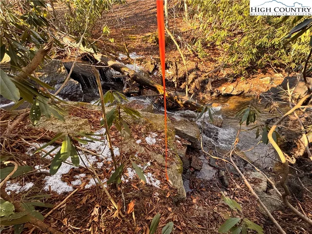 a view of a backyard of the house