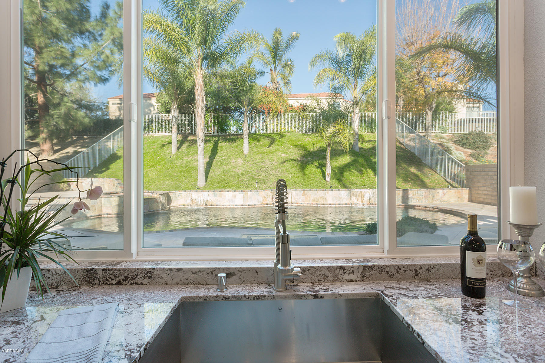 15317 Rains Court Moorpark, CA 93021 - Photo 12 of 34 a bathroom with a granite countertop sink and mirror