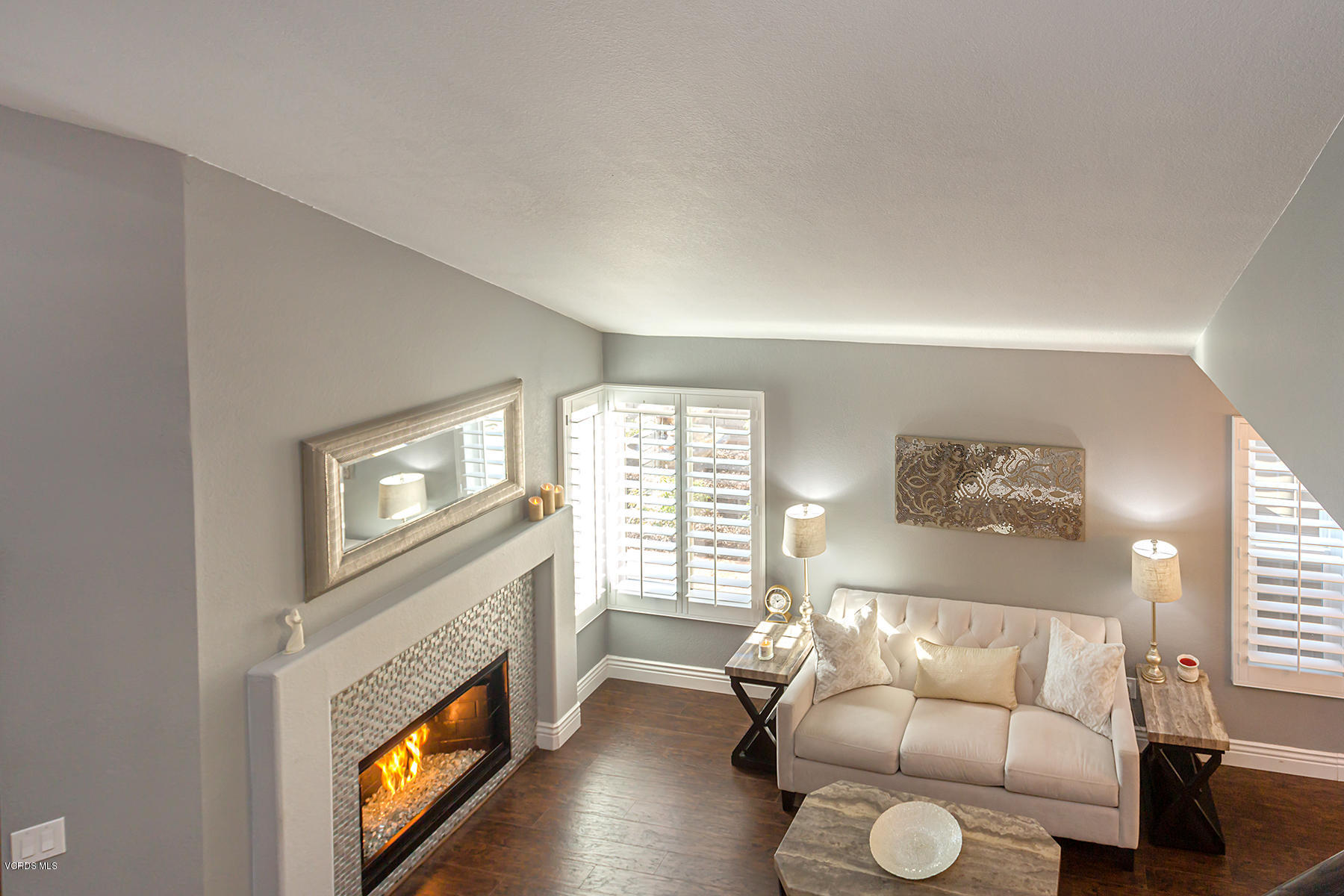 15317 Rains Court Moorpark, CA 93021 - Photo 17 of 34 a living room with furniture and a fireplace