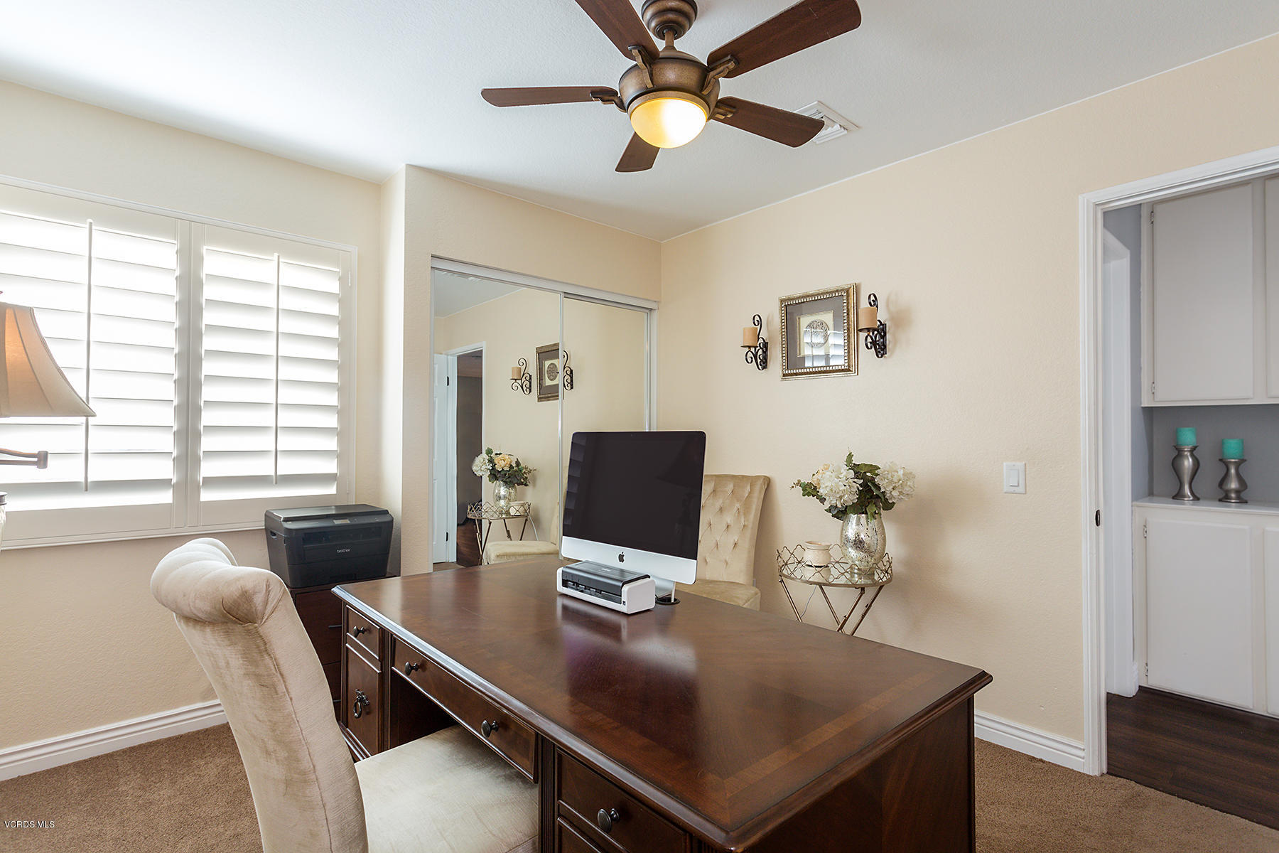 15317 Rains Court Moorpark, CA 93021 - Photo 24 of 34 a view of a workspace with furniture and a window