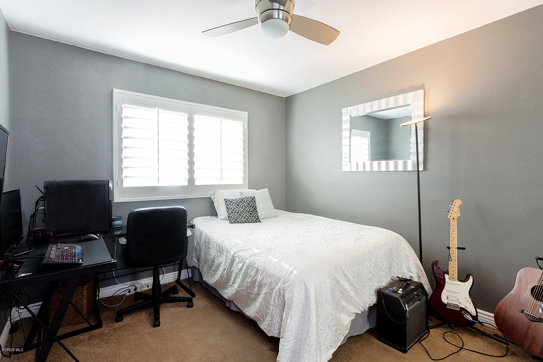 15317 Rains Court Moorpark, CA 93021 - Photo 25 of 34 a bedroom with a bed and a window