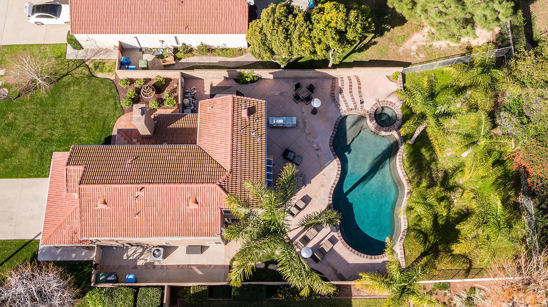 15317 Rains Court Moorpark, CA 93021 - Photo 33 of 34 an aerial view of a house with a yard and large trees