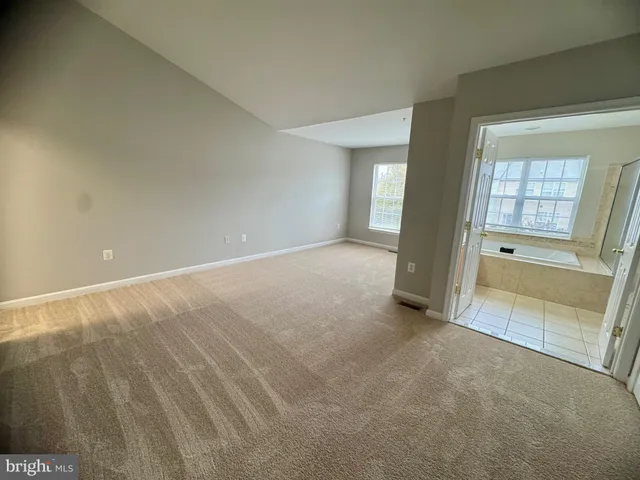 an empty room with window