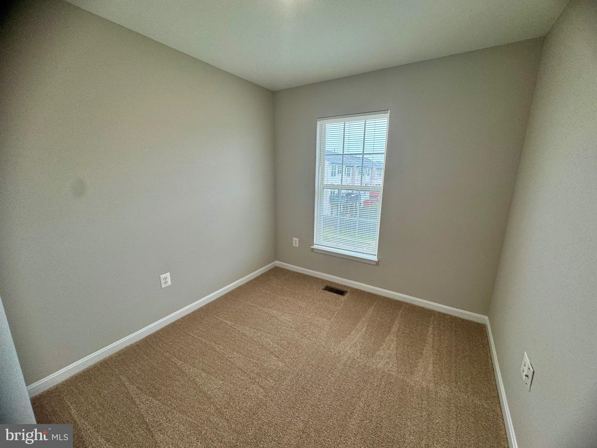 1945 Fieldstone Way Frederick, MD 21702 - Photo 22 of 25 an empty room with windows