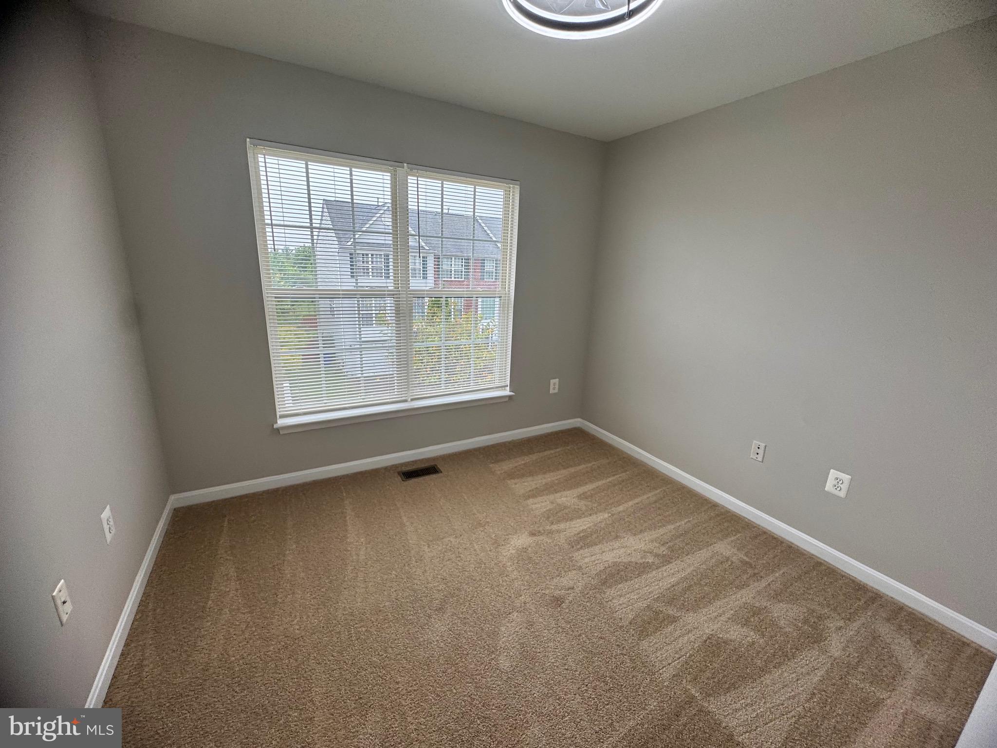 1945 Fieldstone Way Frederick, MD 21702 - Photo 24 of 25 an empty room with a window