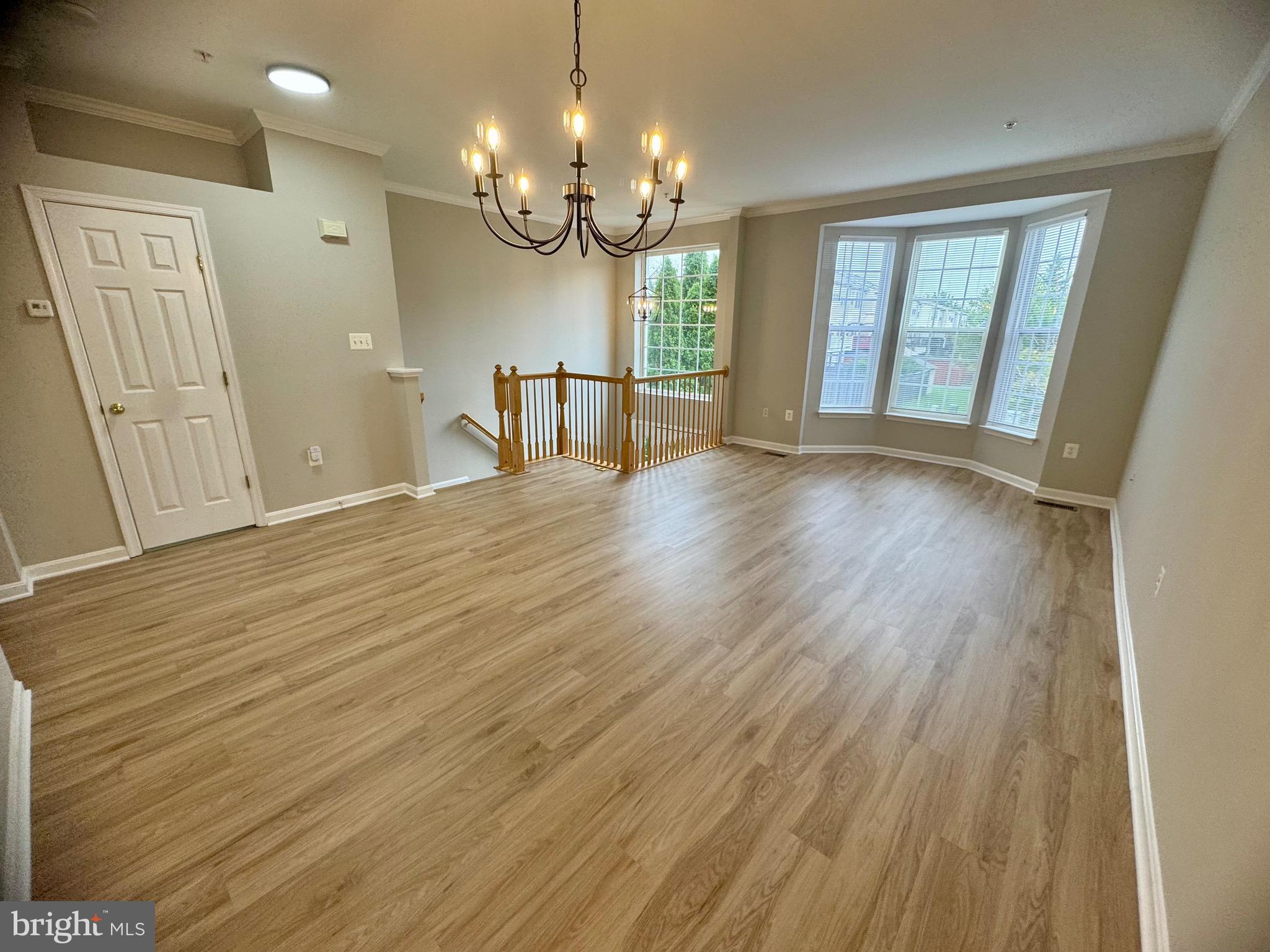 1945 Fieldstone Way Frederick, MD 21702 - Photo 3 of 25 a view of a livingroom with a furniture wooden floor and window