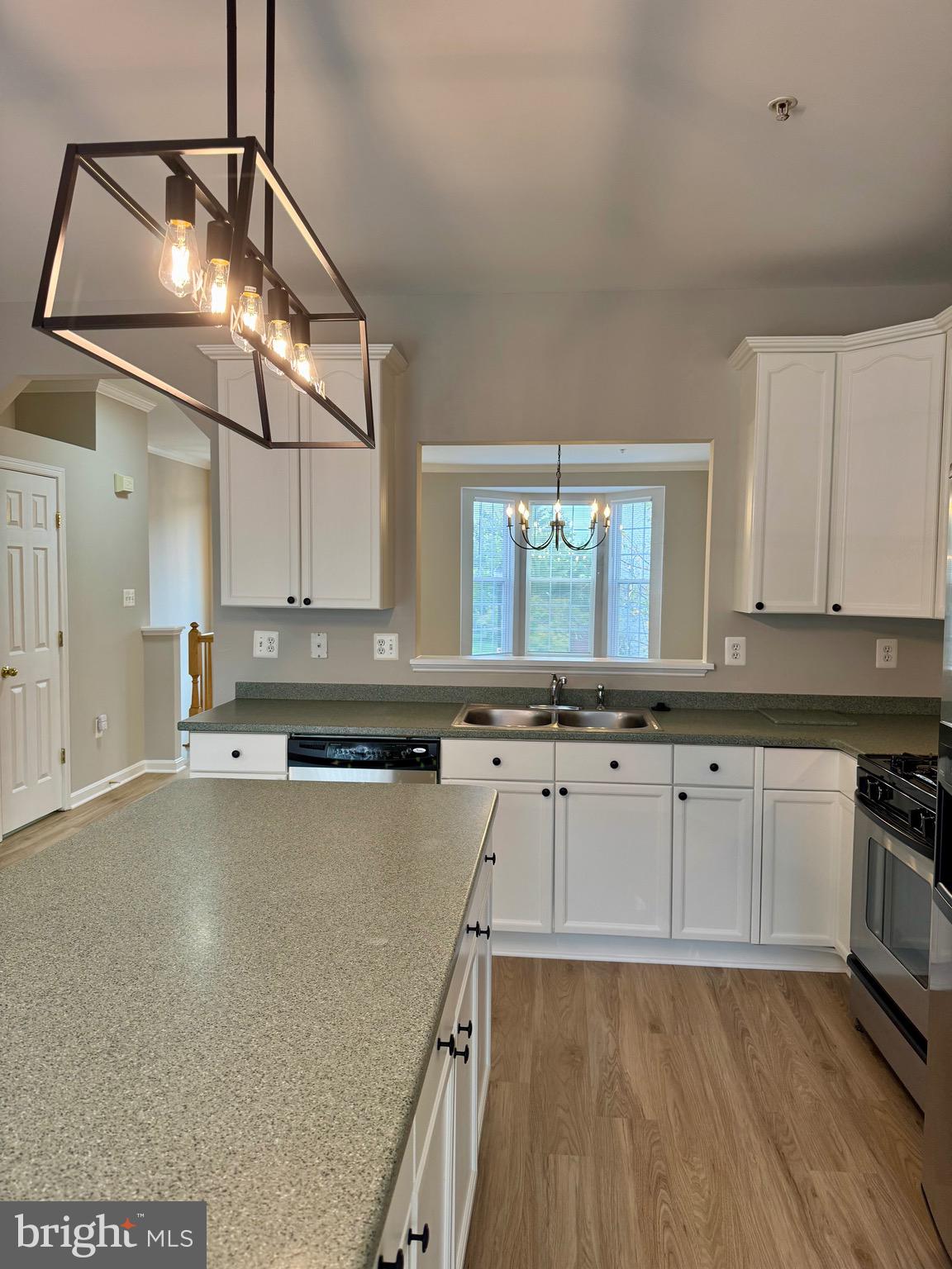 1945 Fieldstone Way Frederick, MD 21702 - Photo 8 of 25 a kitchen with a sink cabinets and window