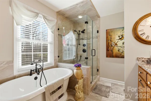 a bathroom with sink and mirror