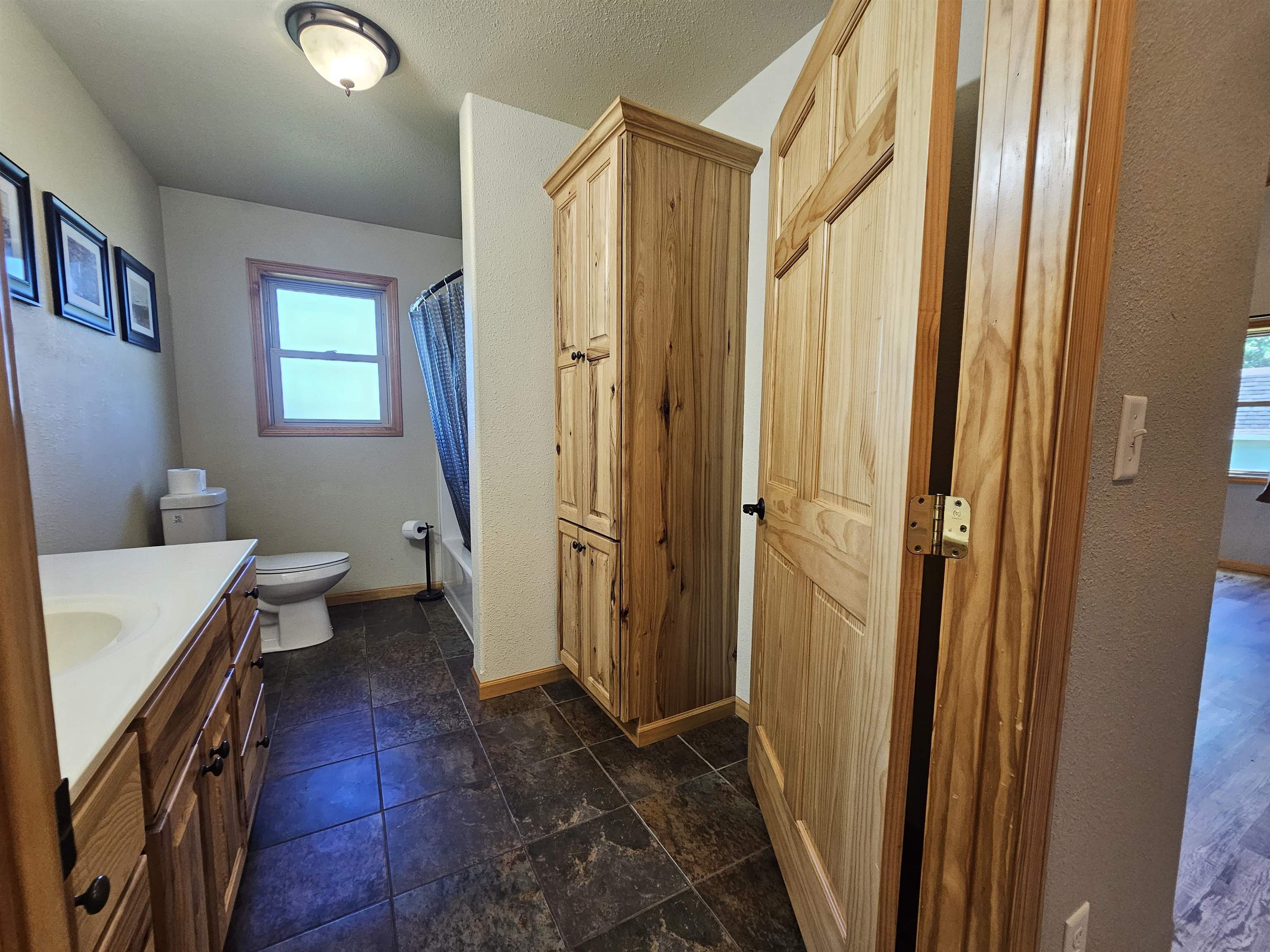 13179 County Rd FF Maple, WI 54854 - Photo 11 of 29 Full bathroom featuring vanity and shower / bathtub combination with curtain