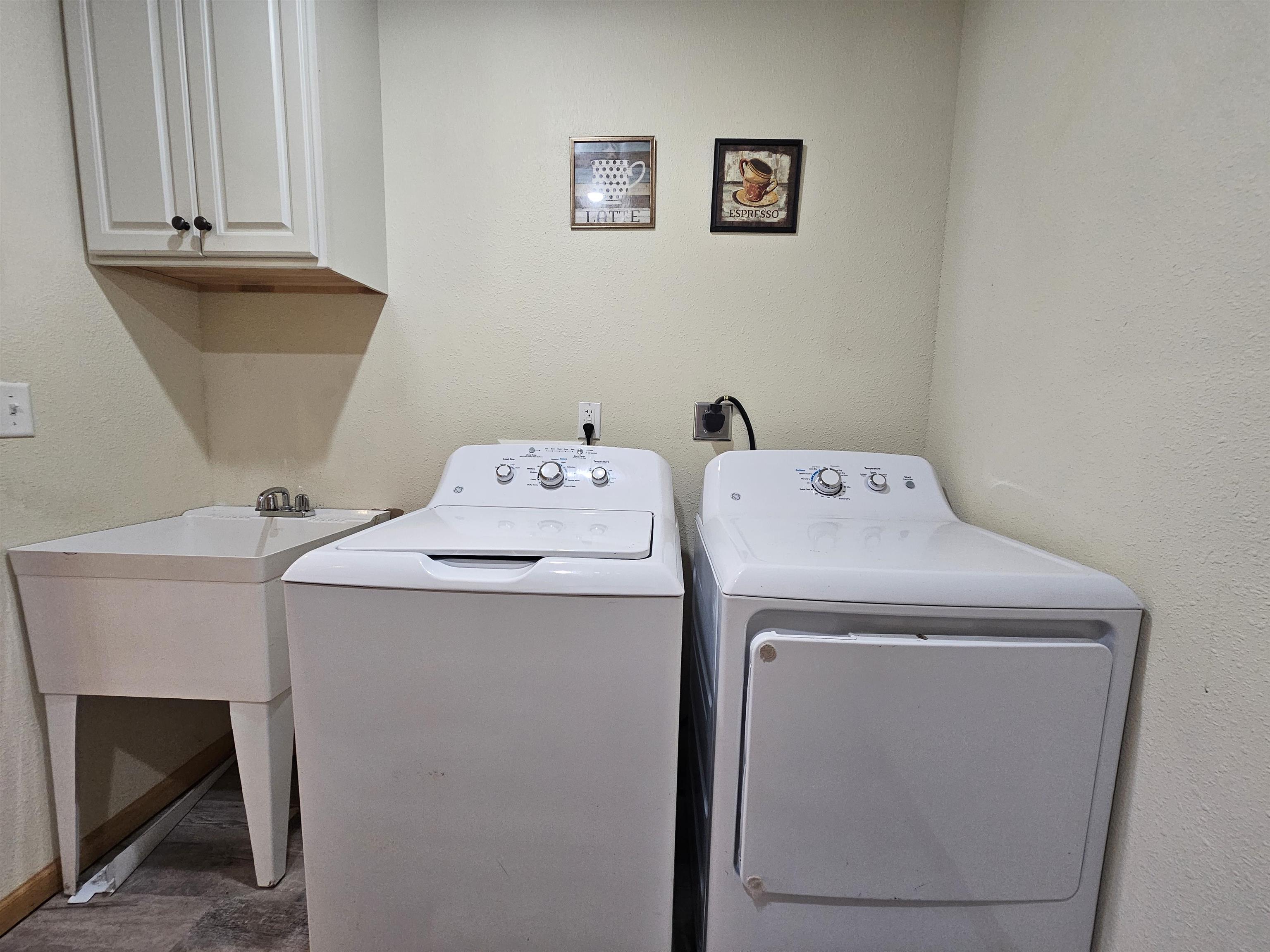 13179 County Rd FF Maple, WI 54854 - Photo 9 of 29 Washroom featuring cabinet space and washing machine and clothes dryer