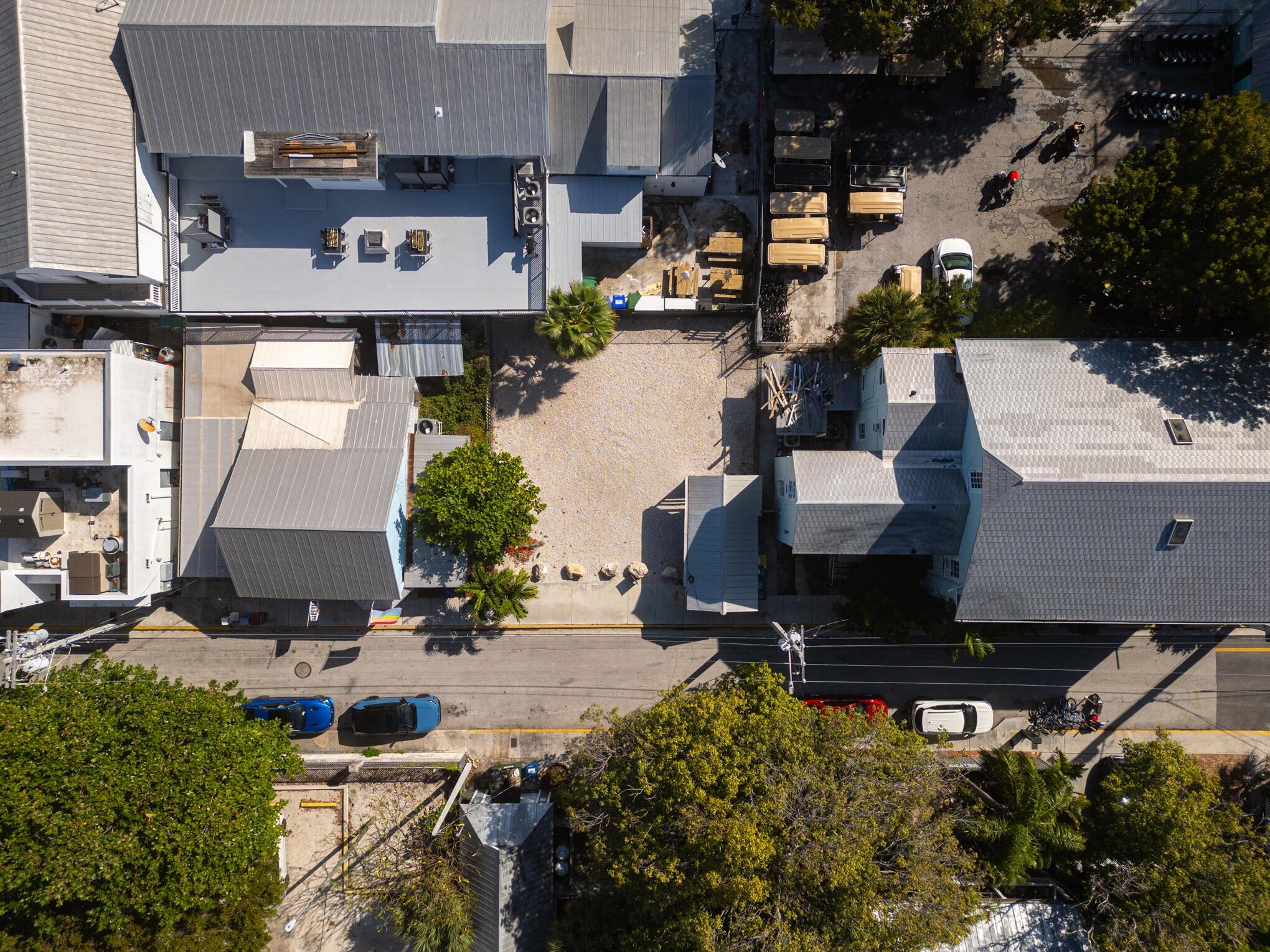 416 Appelrouth Lane Key West, FL 33040 - Photo 2 of 5 an aerial view of a house with a yard and sitting area