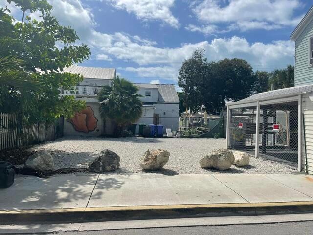 416 Appelrouth Lane Key West, FL 33040 - Photo 3 of 5 a view of a house with a yard