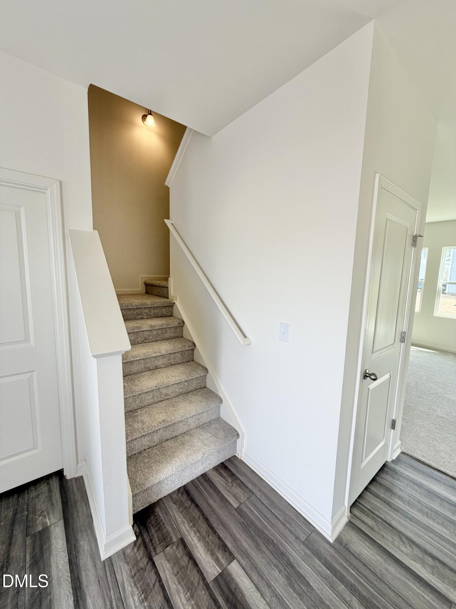 1010 Bombardier Alley Spring Hope, NC 27882 - Photo 14 of 30 a view of a hallway with wooden floor and entryway