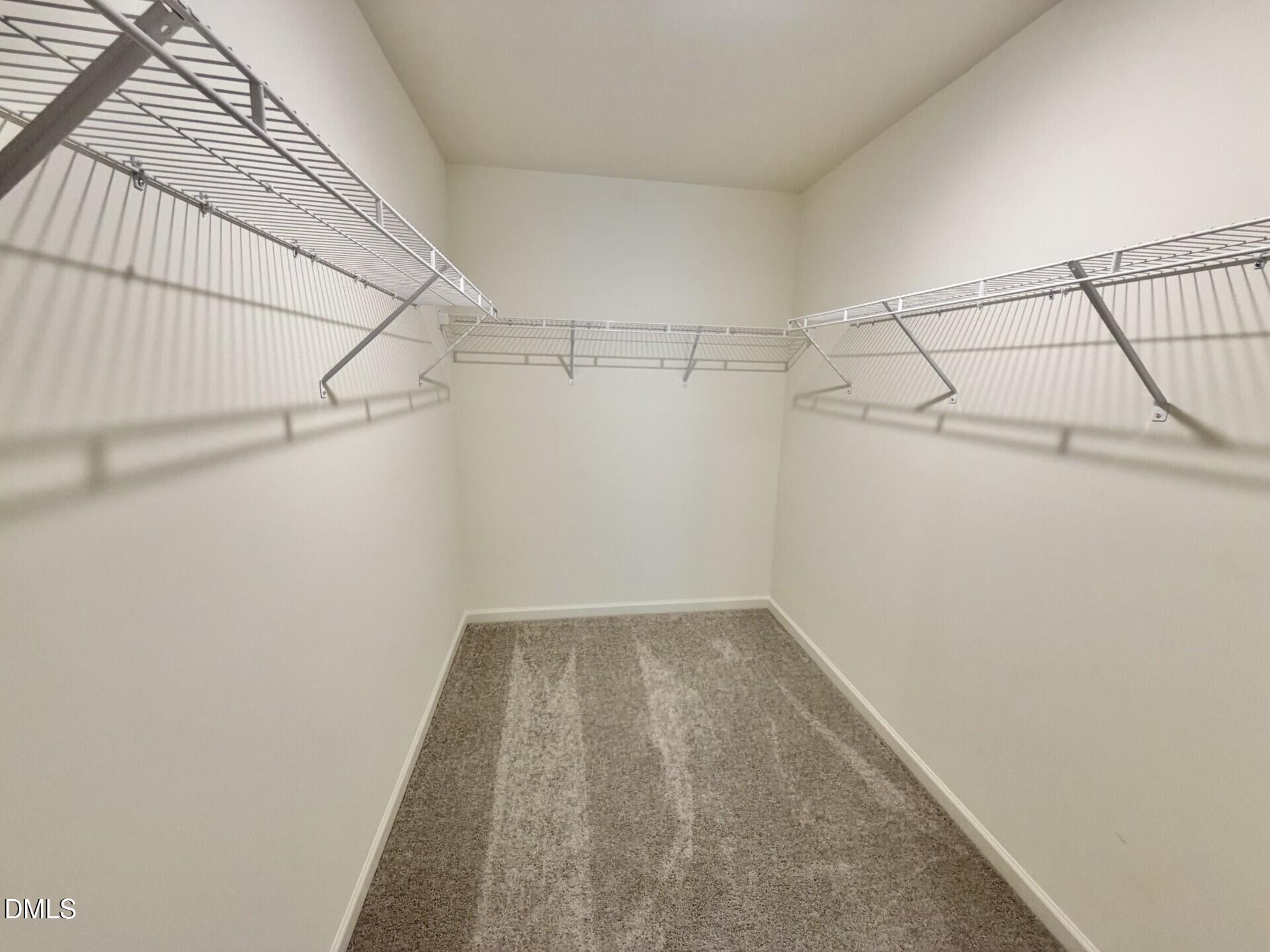 1010 Bombardier Alley Spring Hope, NC 27882 - Photo 18 of 30 a view of a room with racks on the wall