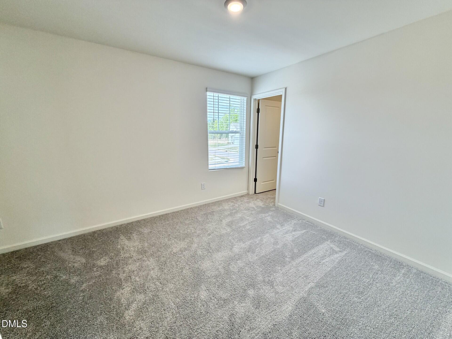 1010 Bombardier Alley Spring Hope, NC 27882 - Photo 21 of 30 a view of an empty room with window