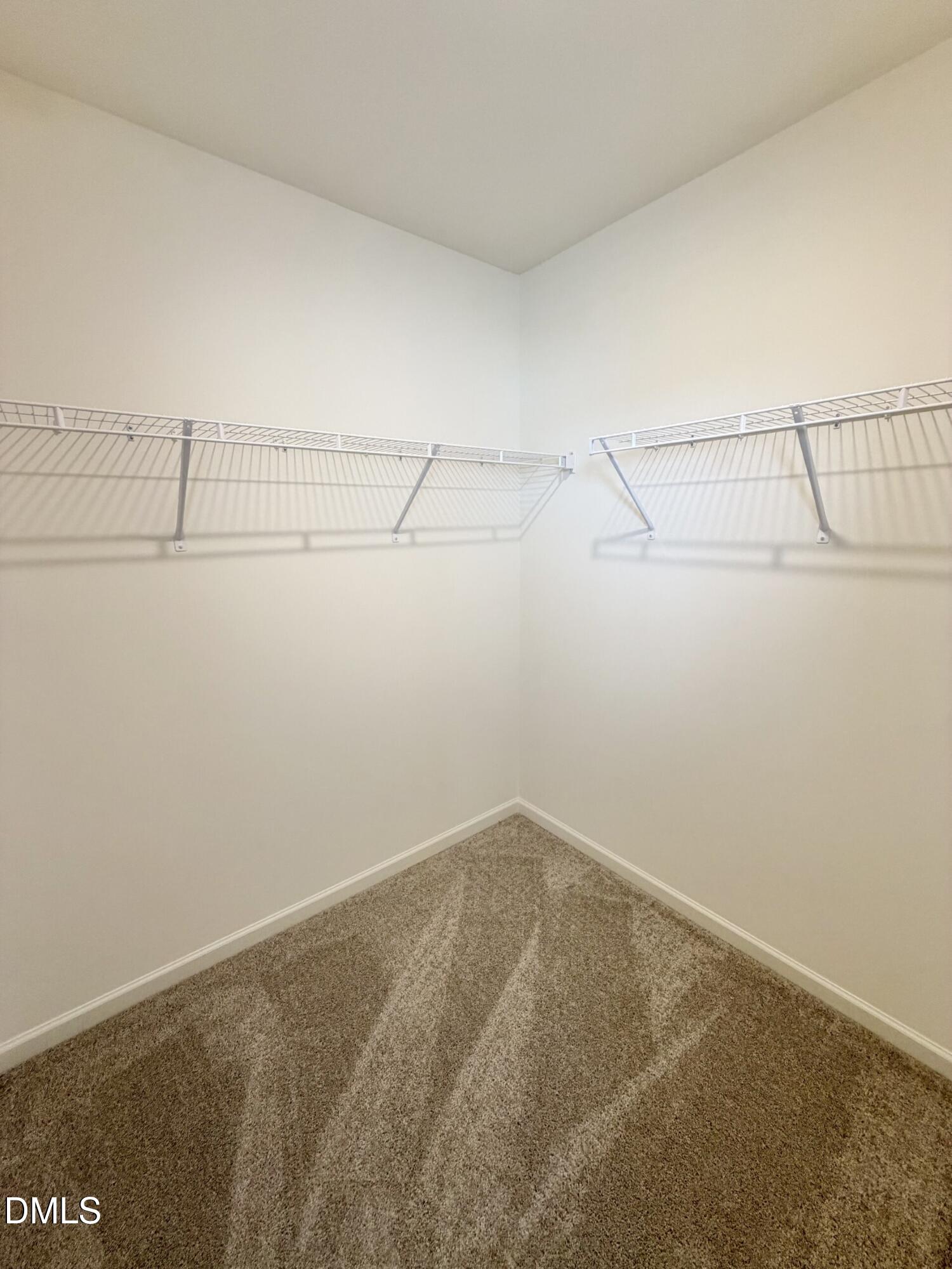 1010 Bombardier Alley Spring Hope, NC 27882 - Photo 22 of 30 a view of a room with racks on the wall
