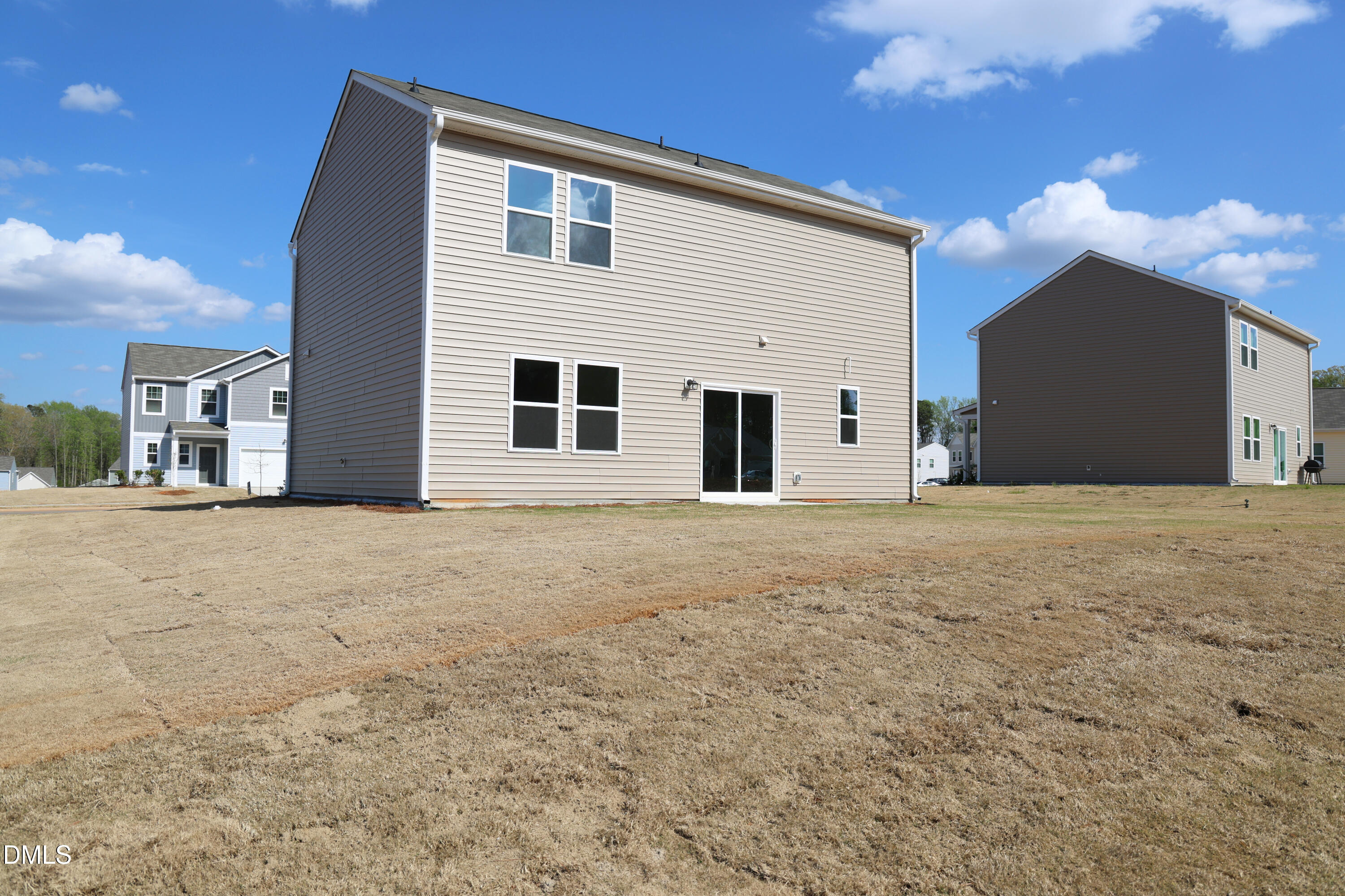 1010 Bombardier Alley Spring Hope, NC 27882 - Photo 27 of 30 a view of a house with a backyard