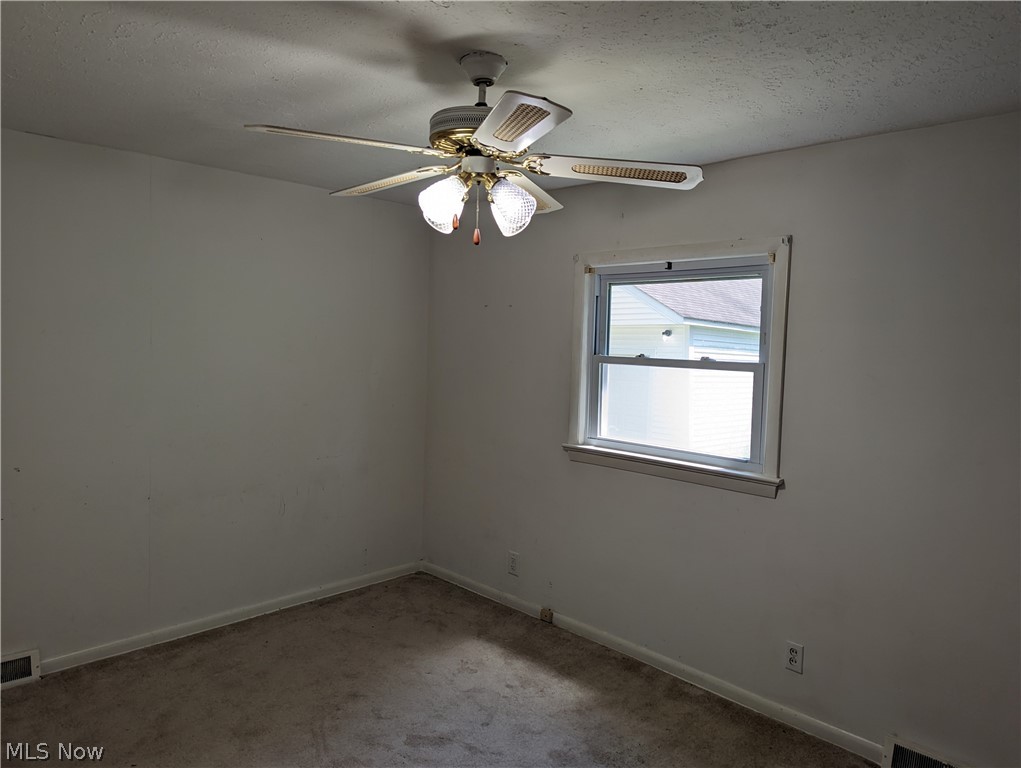 8127 Cedar Road Chesterland, OH 44026 - Photo 7 of 36 Carpeted & featuring ceiling fan