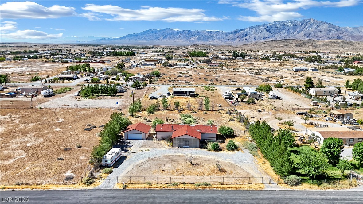 4361 Maple Road Pahrump, NV 89048 - Photo 1 of 46 Discover a private residence with vast open acreage and impressive mountain views.