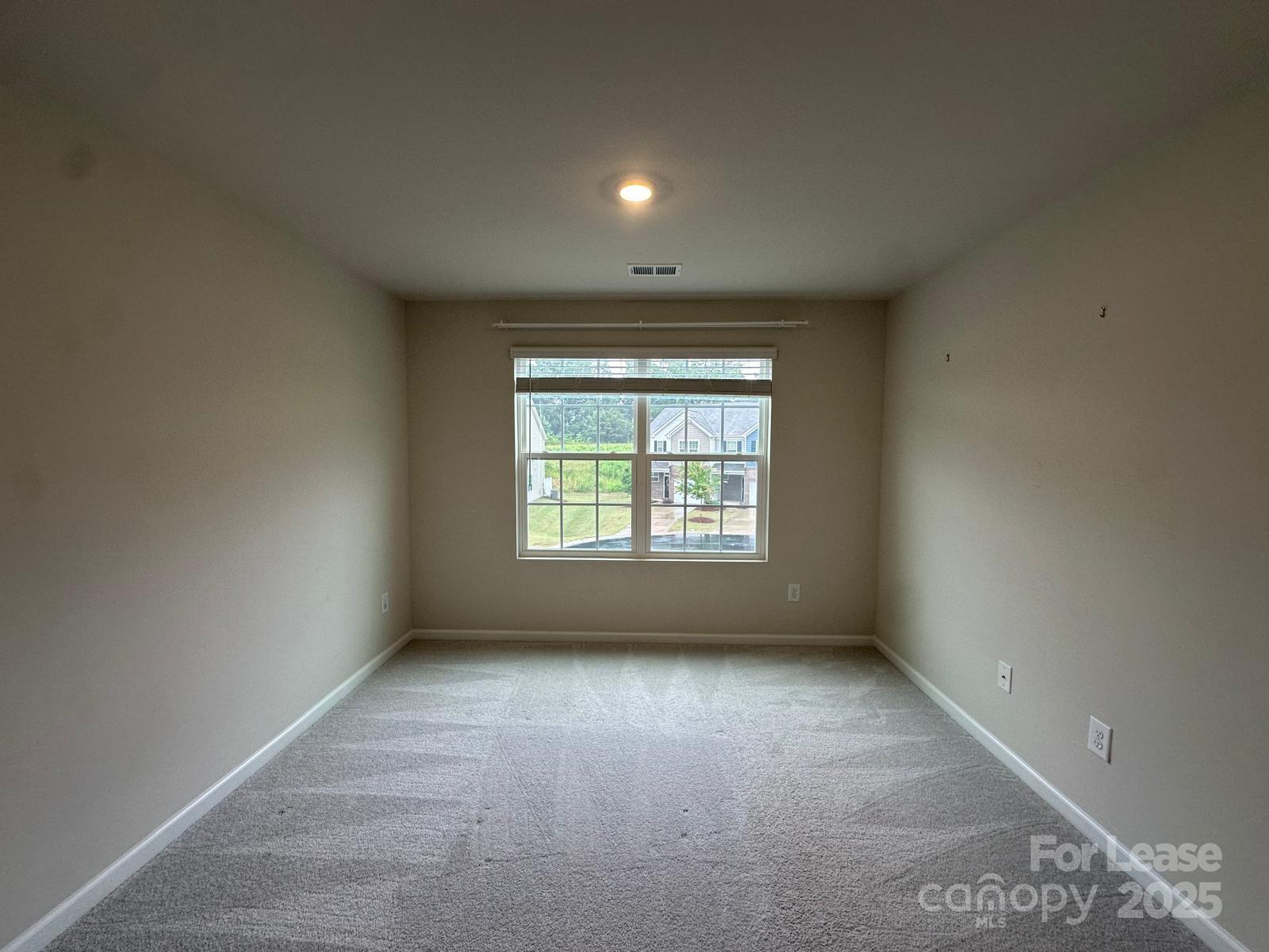 14140 Castle Nook Drive Charlotte, NC 28273 - Photo 8 of 17 an empty room with a window