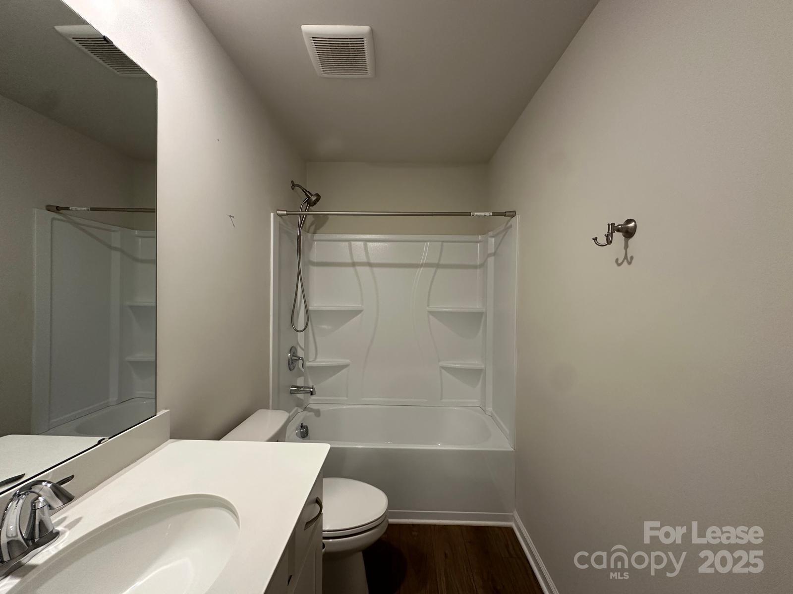 14140 Castle Nook Drive Charlotte, NC 28273 - Photo 10 of 17 a bathroom with a sink toilet and shower