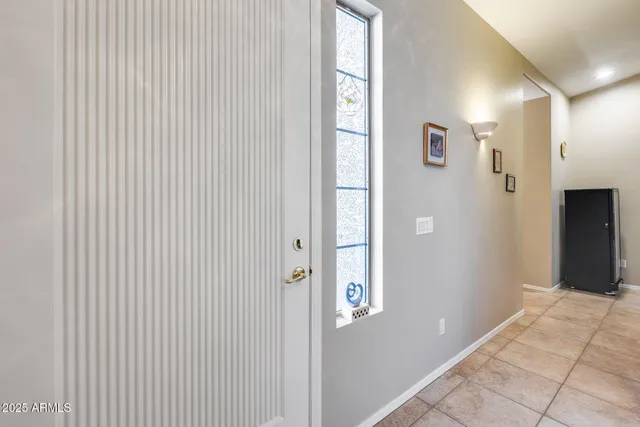 a view of a hallway with closet area