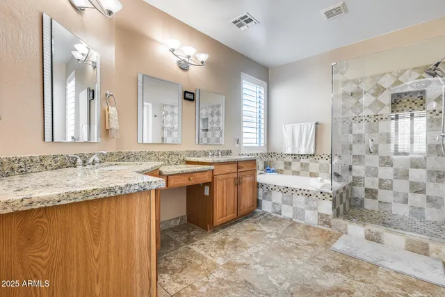 a bedroom with a bed and dresser