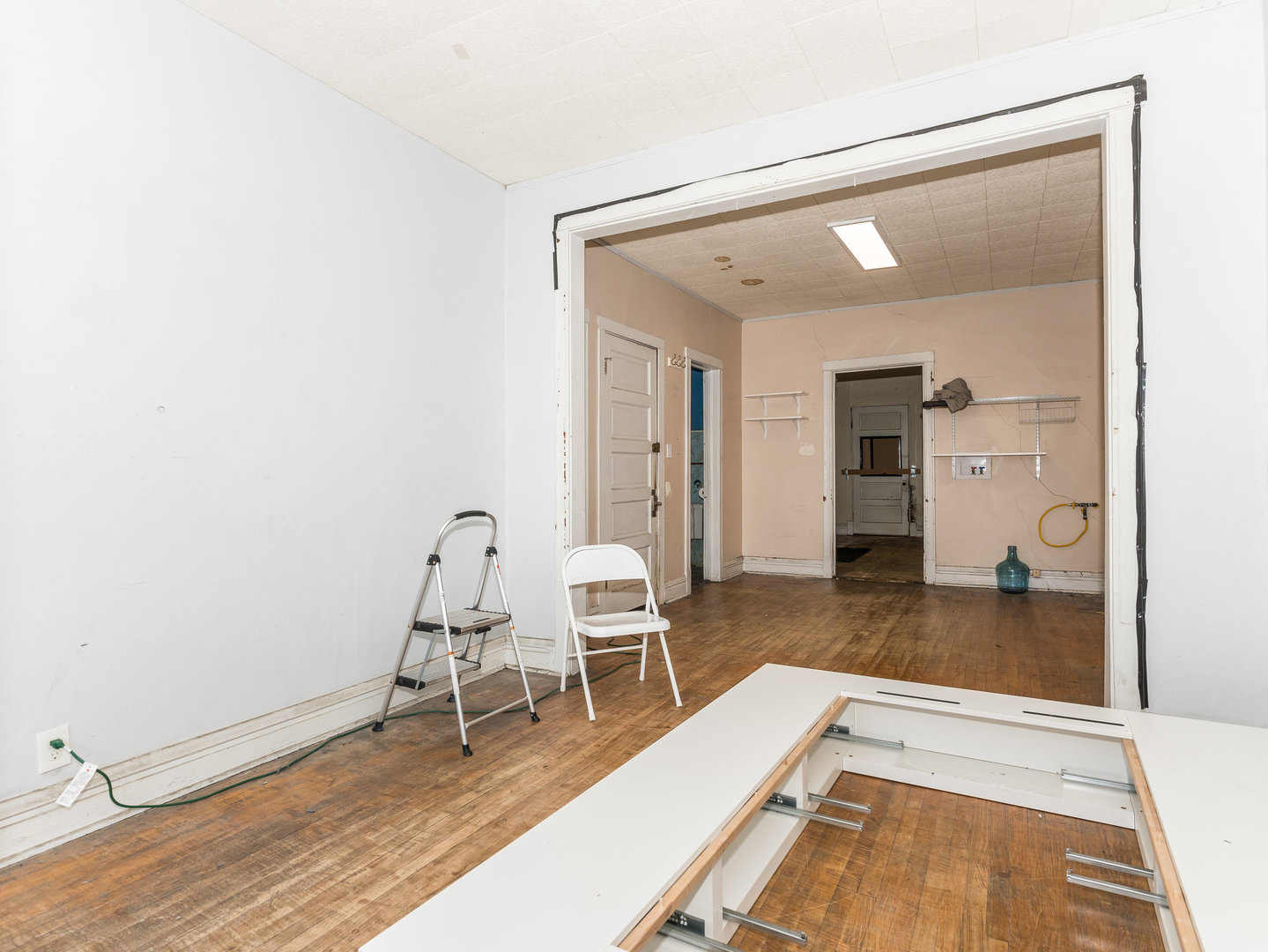 1818 West 46th Street Chicago, IL 60609 - Photo 12 of 14 a view of a livingroom with wooden floor and a rug