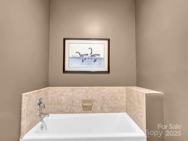 a bathroom with a bathtub