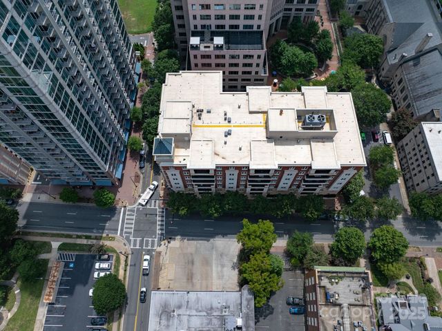a view of multiple houses with outdoor space