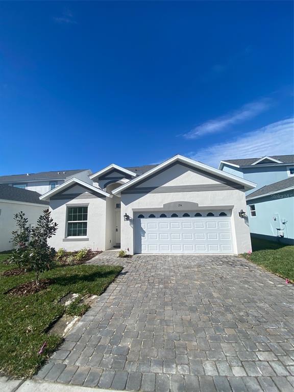754 Reflection Lake Drive Orlando, FL 32807 - Photo 1 of 1 a view of a house with a yard