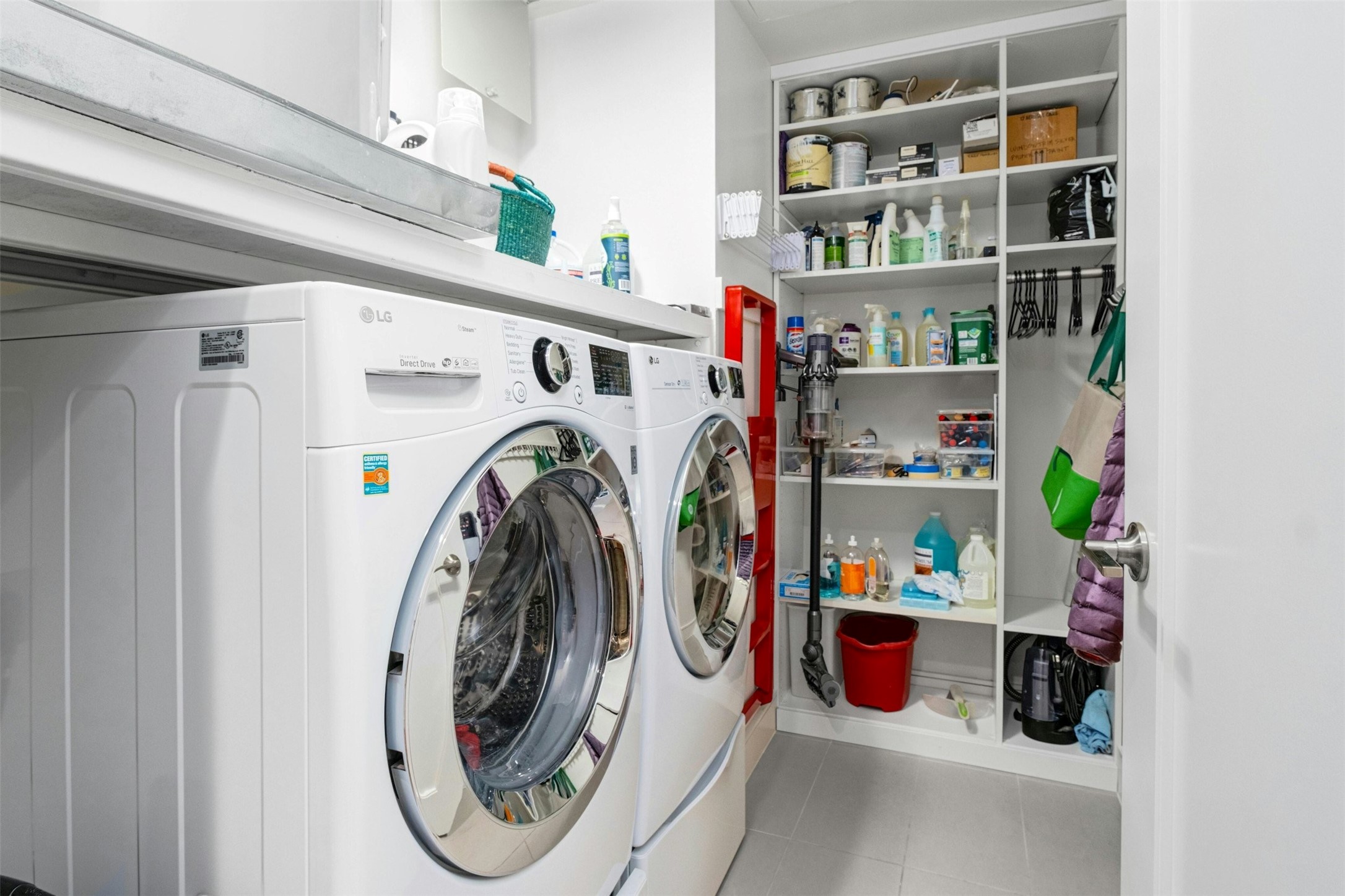 222 West Avenue, Unit 2201 Austin, TX 78701 - Photo 23 of 37 a utility room with dryer and washer