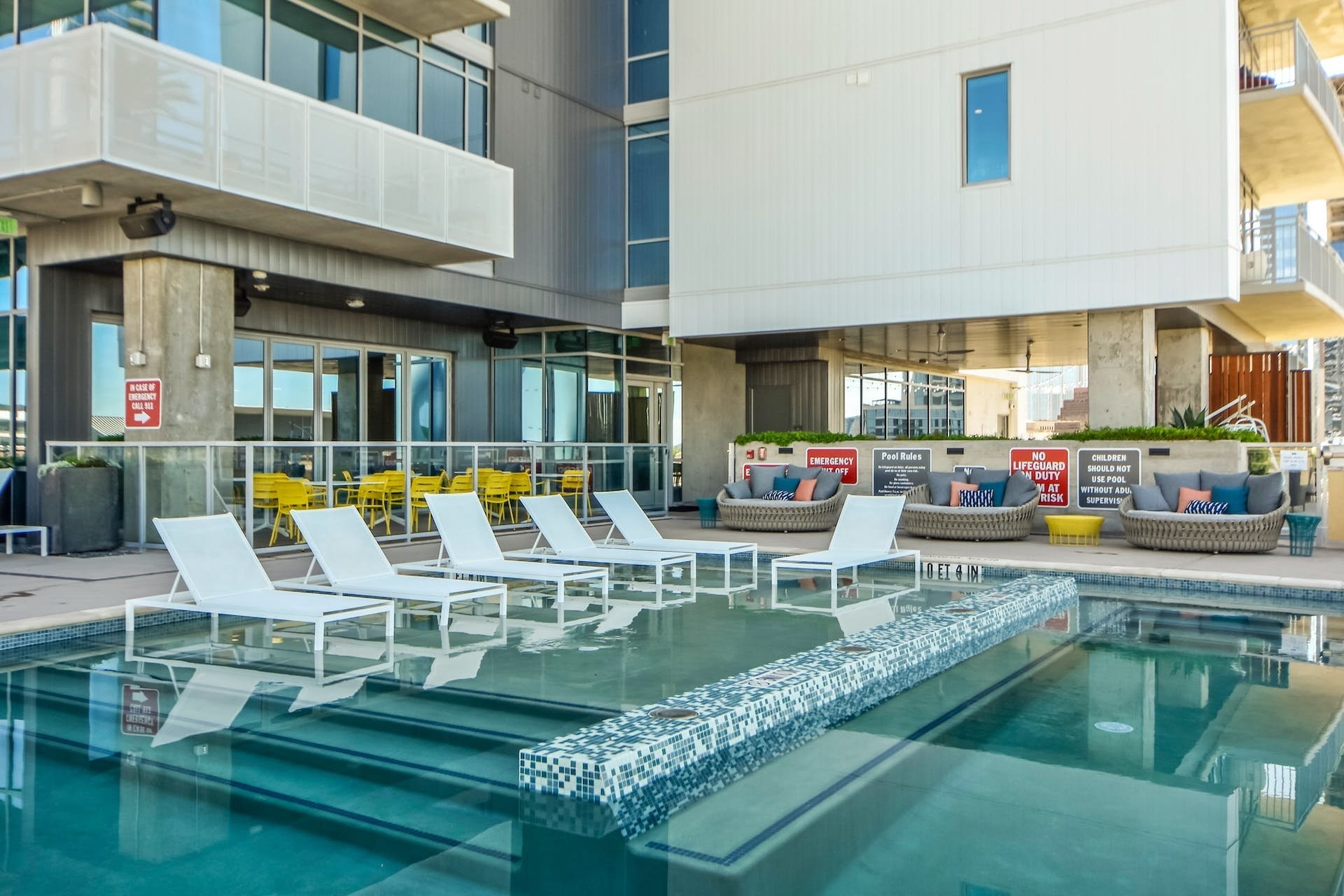222 West Avenue, Unit 2201 Austin, TX 78701 - Photo 27 of 37 a view of a swimming pool with outdoor seating
