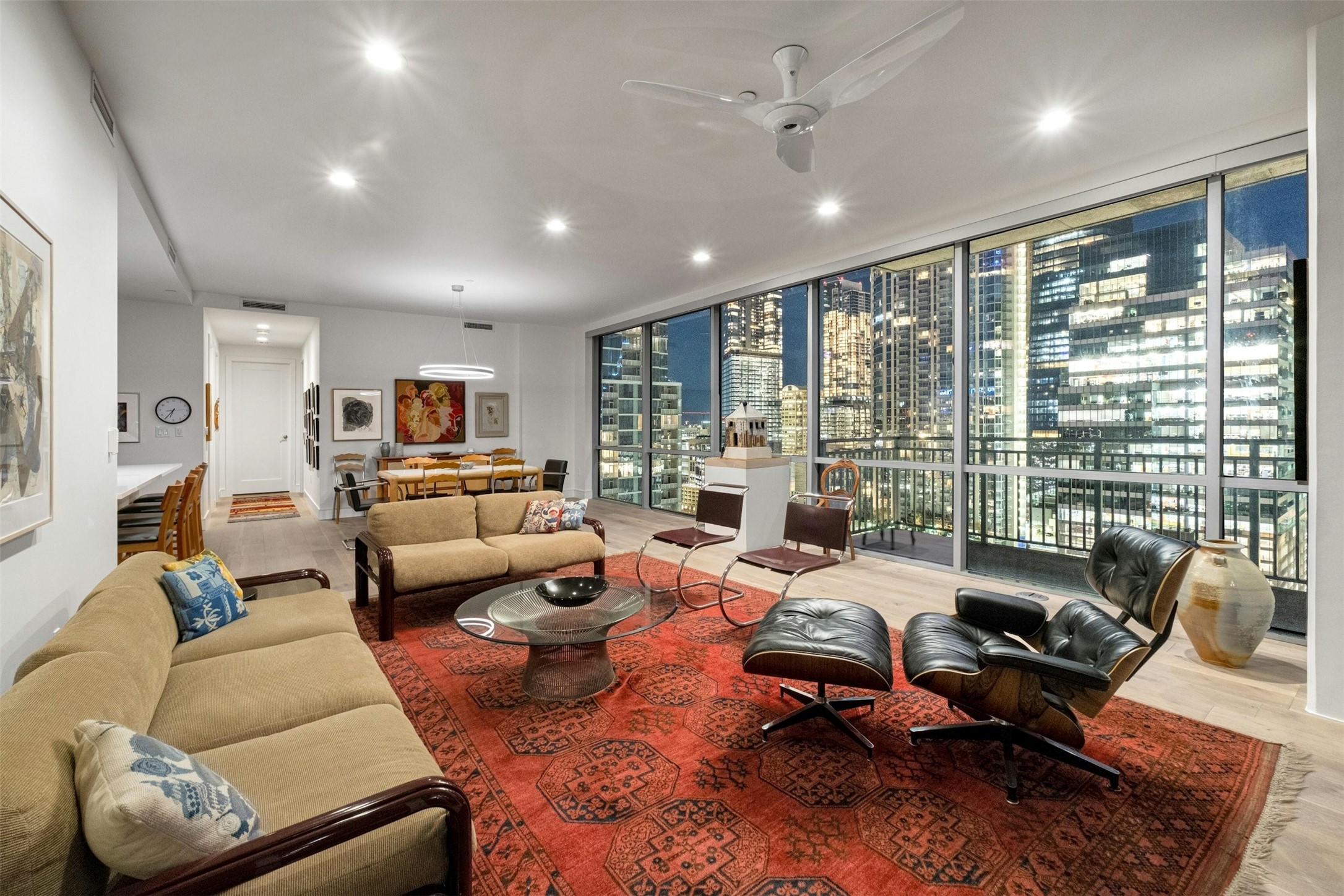 222 West Avenue, Unit 2201 Austin, TX 78701 - Photo 6 of 37 a living room with furniture floor to ceiling window and a view