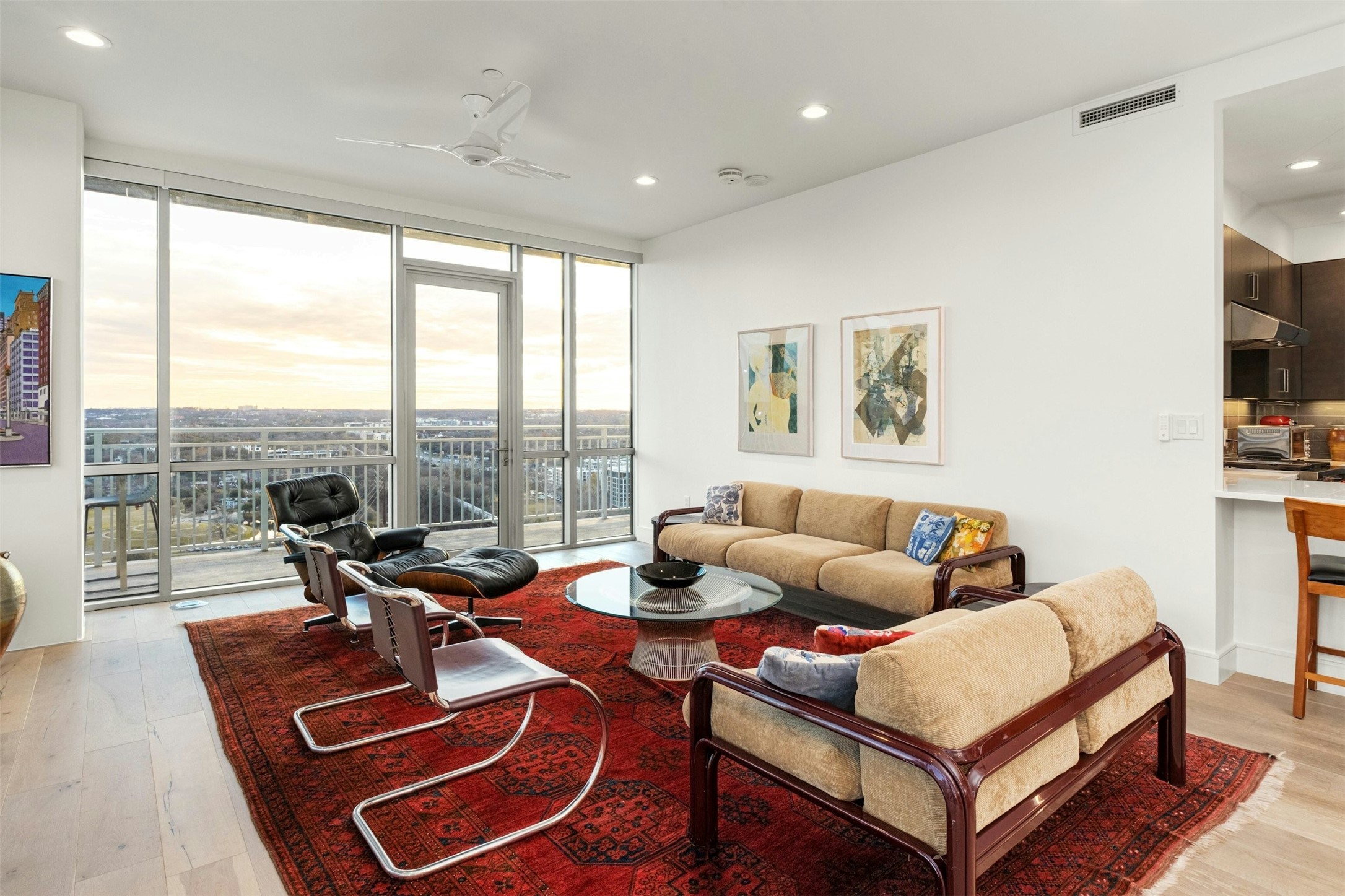 222 West Avenue, Unit 2201 Austin, TX 78701 - Photo 8 of 37 a living room with furniture and a floor to ceiling window