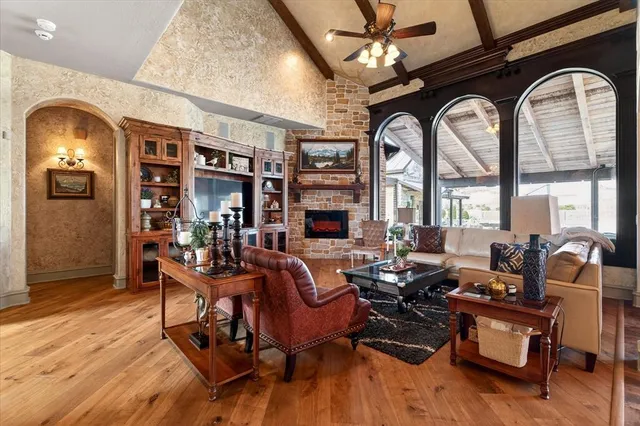 a bathroom with a sink a mirror and a shower