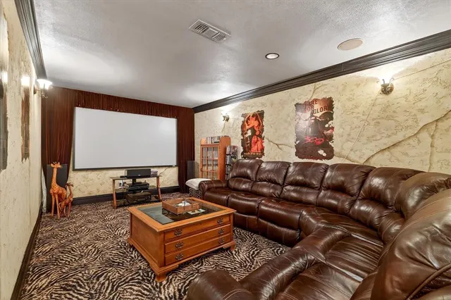 a bedroom with a bed and dresser