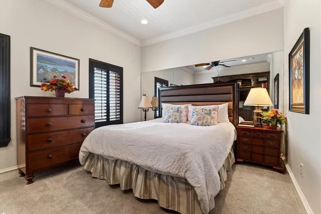 a view of walk in closet with clothes