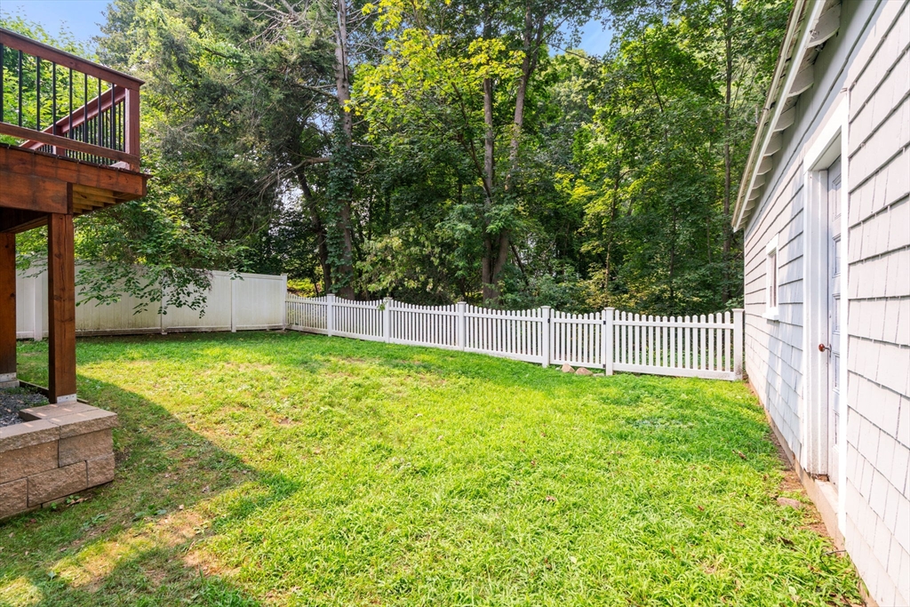 21 Prospect Street Maynard, MA 01754 - Photo 35 of 40 a view of a backyard with a garden