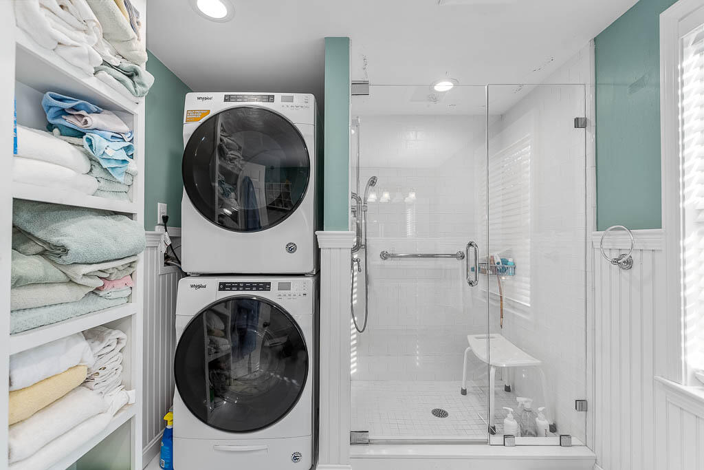 21 Spinning Brook Road South Yarmouth, MA 02664 - Photo 15 of 21 a view of a hallway with washer and dryer