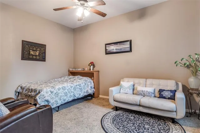 a bedroom with furniture and a couch