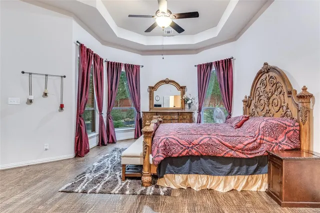 a bed room with a bed and a window