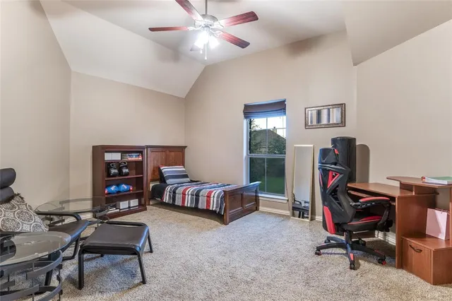 a view of a workspace with furniture and toys