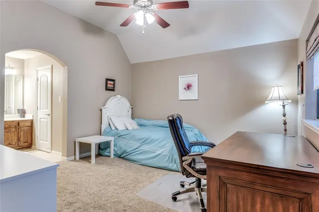 a workspace with furniture and a chandelier