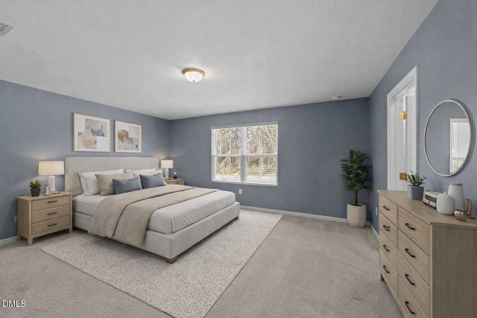 1421 Justice Union Court Raleigh, NC 27604 - Photo 1 of 21 a bedroom with a large bed and a dresser