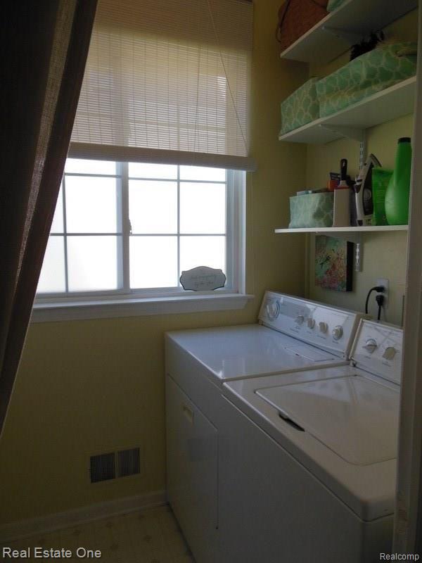 2539 Ravine Side North Howell, MI 48843 - Photo 26 of 43 1st Floor laundry