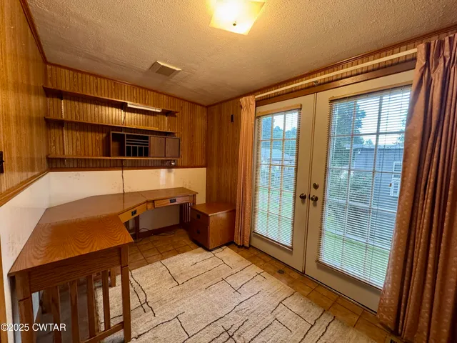 a bathroom with a sink mirror vanity and toilet