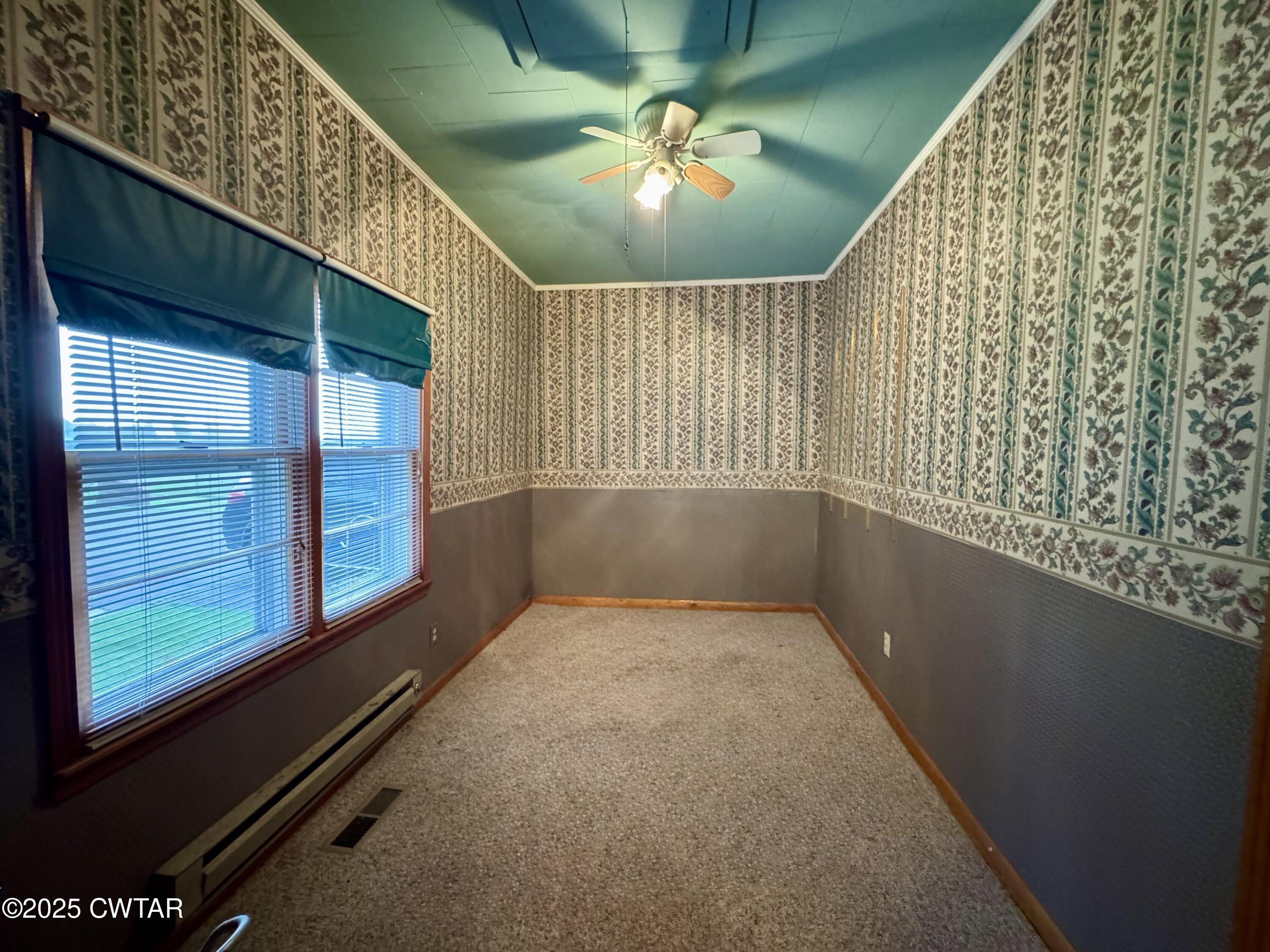 4985 McClard Road Union City, TN 38261 - Photo 17 of 27 a view of an empty room and window