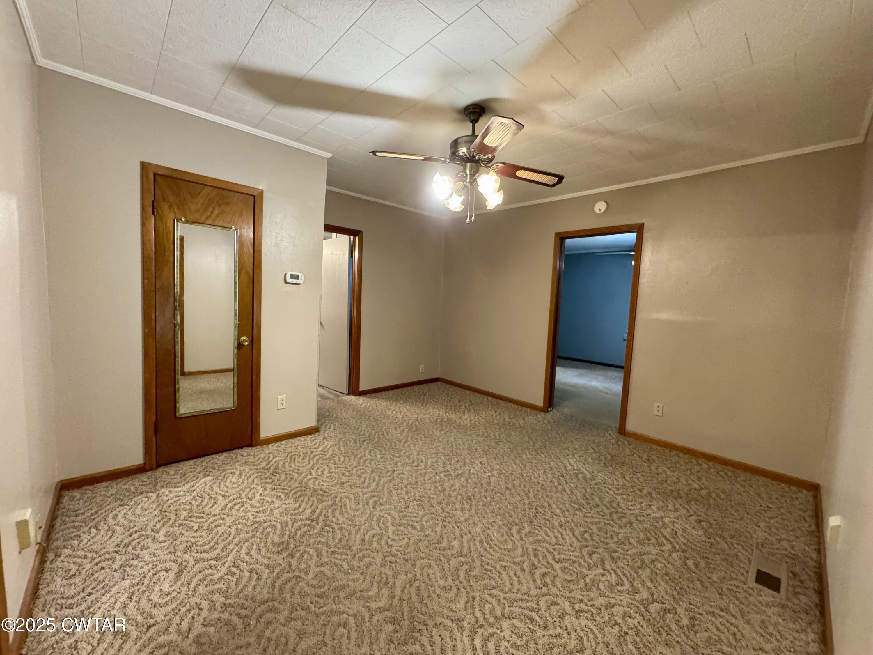 4985 McClard Road Union City, TN 38261 - Photo 4 of 27 a view of a livingroom with a ceiling fan